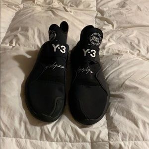 Pair of all black neoprene shoes